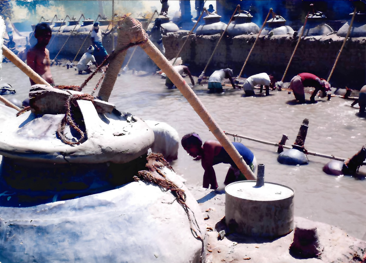 Traditional riverside attar distillation in Kannauj